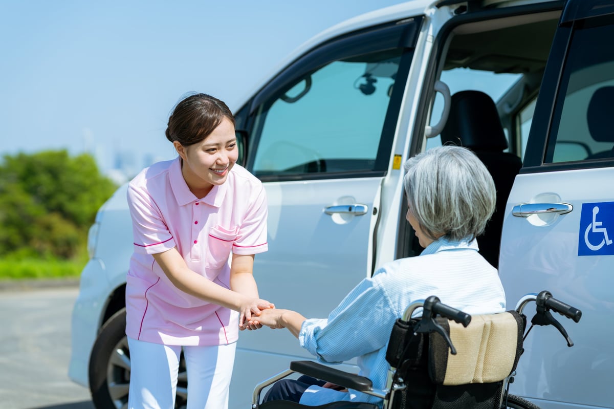 Caregiver picking up and dropping off a patient